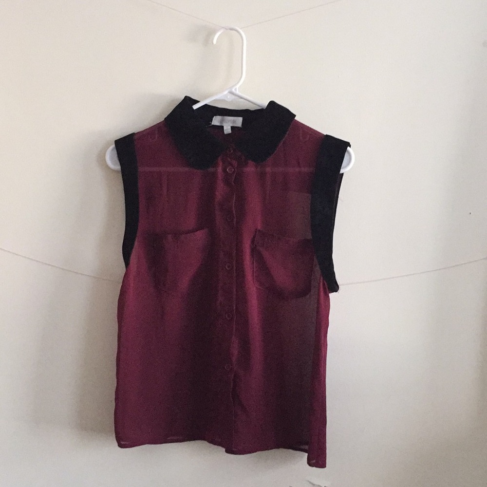 Sleeveless button up blouse